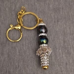 Luxurious Gold and Black Key Holder with Floral Design